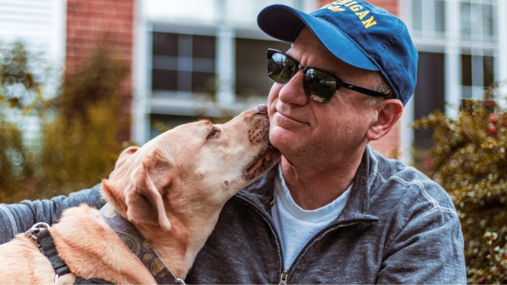 Middle aged man with his emotional support animal