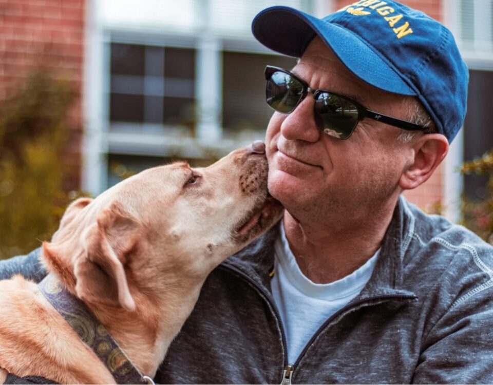 Middle aged man with his emotional support animal