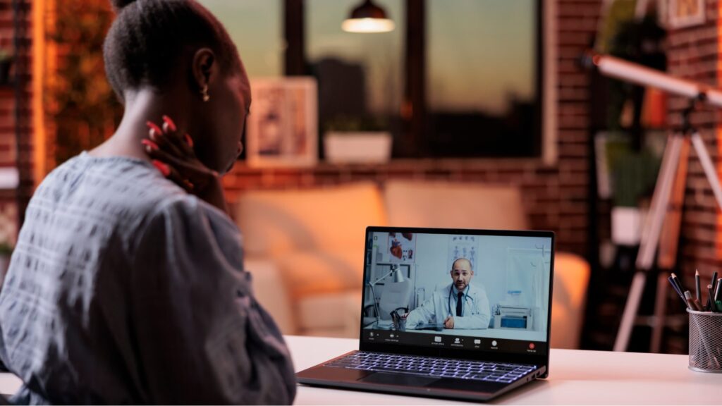 Woman getting her medical marijuana card in Colorado via telehealth appointment