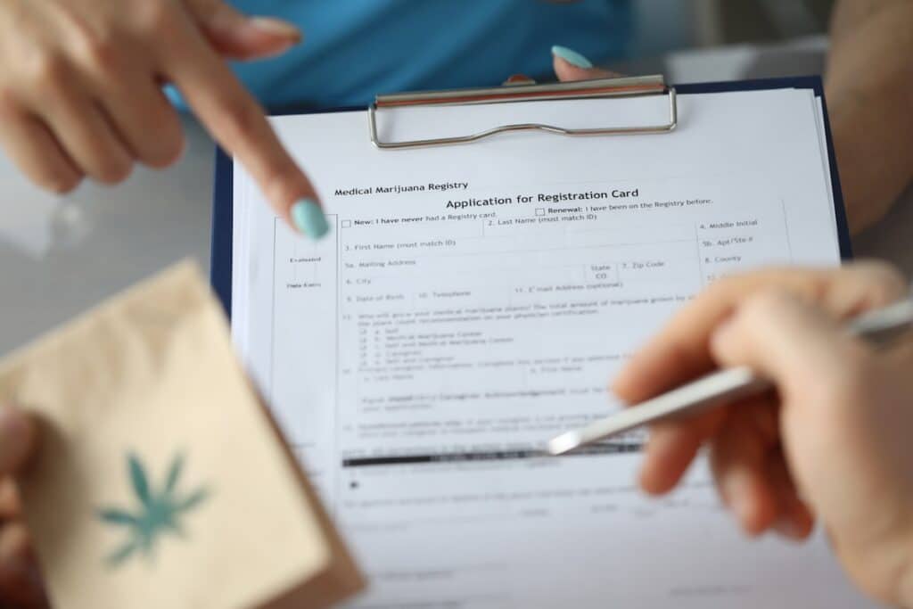 Patient filling out an application for Ohio medical marijuana card